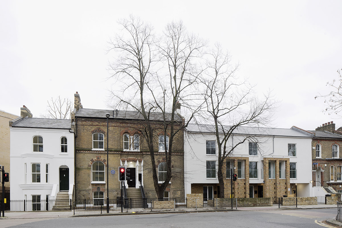 View of the whole Lambeth social housing project which utilised lime greens warmshell lime render